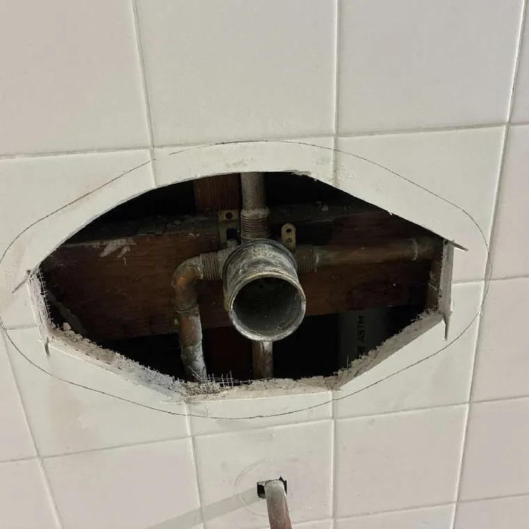 Shower valve plumbing repair in Tahlequah