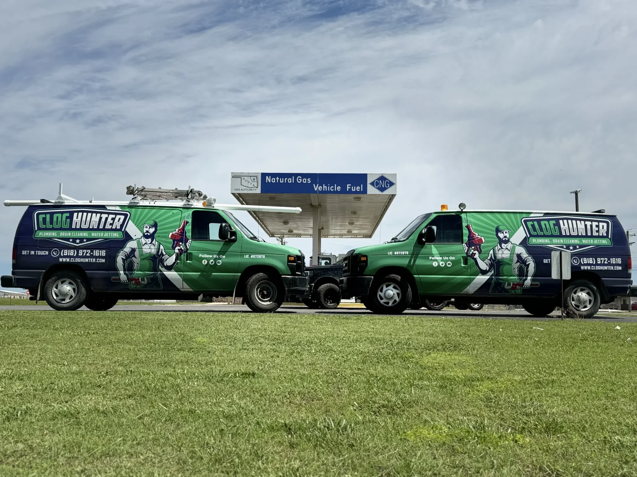 Clog Hunter's wrapped plumbing fleet serving commercial customers in Eastern Oklahoma