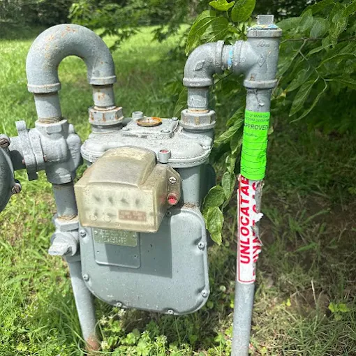 Clog Hunter locating and marking a buried gas line